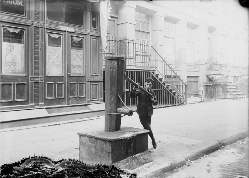 Old New York City sidewalk water pump.